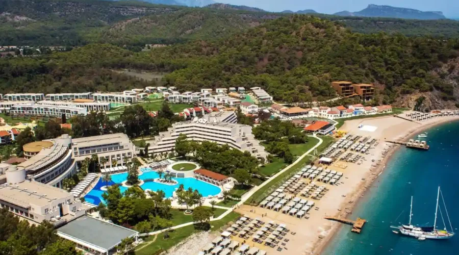 Aerial view of Rixos Premium Tekirova with multiple swimming pools and a private beach