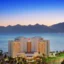 A panoramic view of Akra Hotel Antalya Lara, showcasing its beachfront location and luxurious amenities.