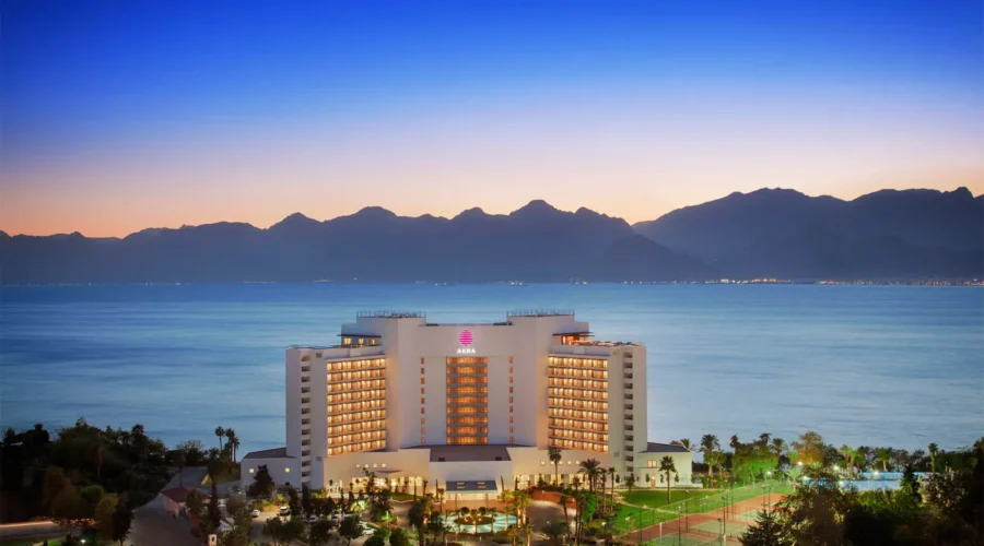 A panoramic view of Akra Hotel Antalya Lara, showcasing its beachfront location and luxurious amenities.