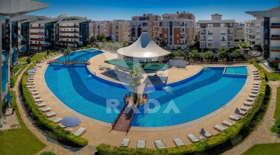 Family-friendly pool at Onkel Rada Apart Hotel, offering Antalya apartments for rent with access to top amenities Garden Pool View