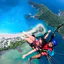 Tandem paragliding over Oludeniz, Turkey, showcasing the Blue Lagoon and coastline – explore paragliding Oludeniz Turkey prices starting at $150 with Antalya Activities